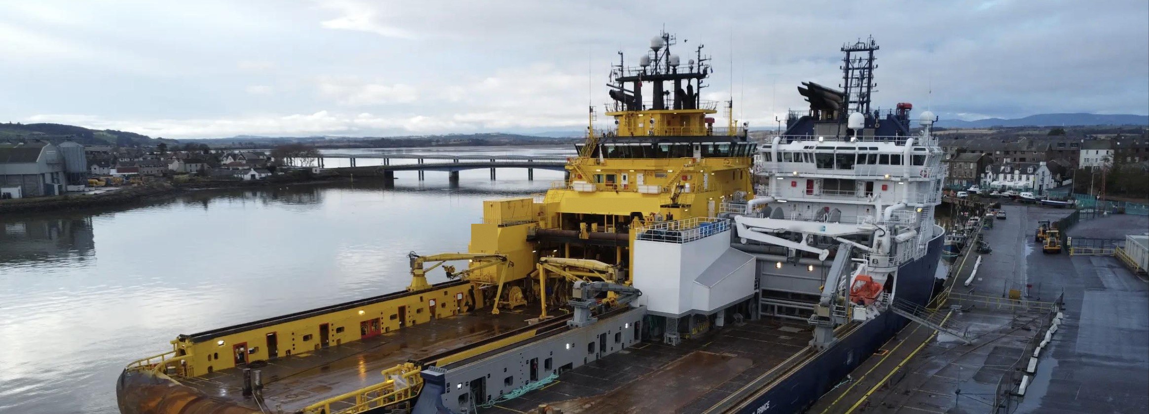 Offshore Project Support Services — Support Vessel in Port Offshore support vessel moored at a harbour quay, illustrating NautikOne's offshore project support services