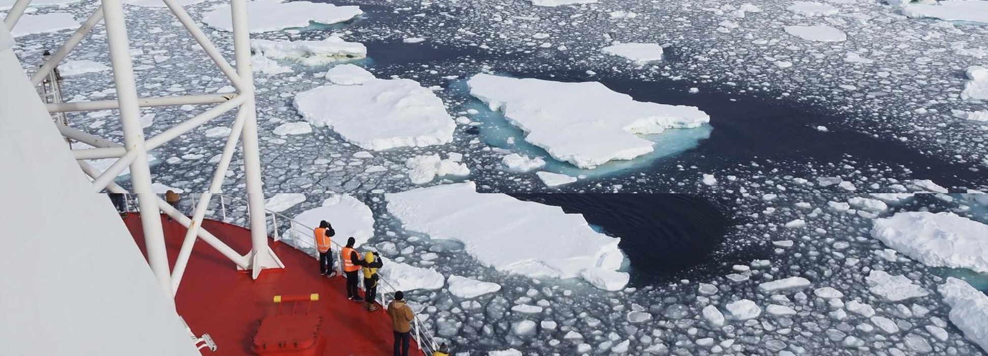Polar and Ice Navigation Services — Icebreaker in Arctic Ice Icebreaker vessel navigating through Arctic pack ice, illustrating NautikOne's Polar and ice navigation consulting services